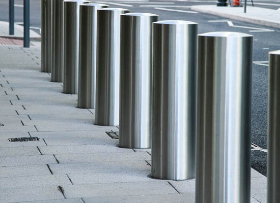 Heavy-duty stainless steel security bollards row for perimeter protection